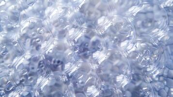 Macro View of Translucent Bubble Wrap Texture in Soft Focus for Design and Packaging Concepts photo
