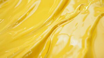 Glossy Yellow Enamel Paint Close-Up Texture for Design and Art Projects photo