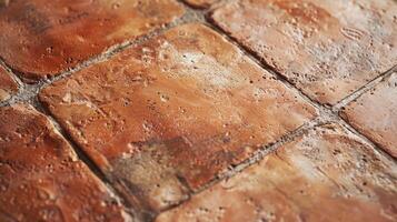 Close-Up of Rustic Terracotta Tile Surface with Textured Earthy Details and Rough Finishes for Design Print or Background Use photo