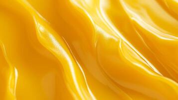 Smooth Yellow Plastic Texture for Design Backgrounds, Close-Up of Glossy and Wavy Surface photo