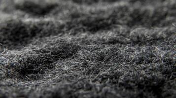 Close-Up Texture of Dark Gray Wool Felt Surface for Design and Textile Applications photo