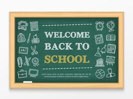 Welcome back to school text and hand drawn icons on blackboard vector