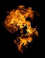 Fire and burning flame of explosive fireball isolated on dark background for abstract graphic design photo