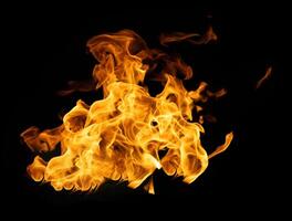 Fire and burning flame of explosive fireball isolated on dark background for abstract graphic design photo