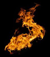 Fire and burning flame of explosive fireball isolated on dark background for abstract graphic design photo