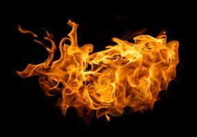 Fire and burning flame of explosive fireball isolated on dark background for graphic design usage photo