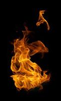Fire and burning flame of explosive fireball isolated on dark background for abstract graphic design photo