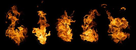 The set of fire and burning flame isolated on dark background for graphic design photo