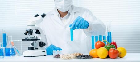 Scientist check chemical fruit residues in laboratory. Control experts inspect the concentration of chemical residues. hazards, standard, find prohibited substances, contaminate, Microbiologist photo