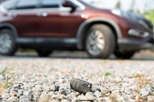 Lost car keys on the ground, Car keys dropped on the floor or fall lying on the street home front. Walking Away From Lost Car Key, can not transport, express, rush time, wast time, emergency photo