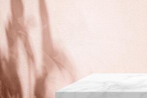 Minimal White Marble Table Corner with Shadow and Pink Light Beam on Concrete Wall Background photo