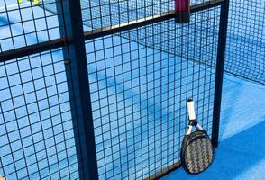 Blue padel and tennis net and hard court. Tennis competition concept. Horizontal sport theme poster, greeting cards, headers, website and app photo