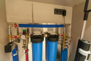 Water filter housing. Drinking Water System. Osmosis water purification filter for home use. healthy lifestyle. photo