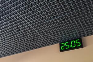 Digital clock in airport terminal. photo