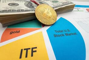 Bitcoin coin is on background of stock chart photo
