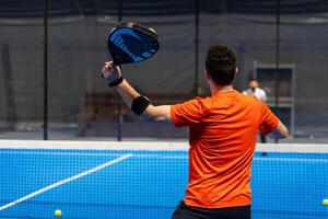 Paddle training of a young player photo