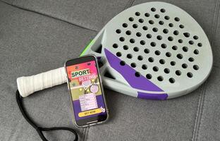 padel tennis and sports betting on a smartphone photo