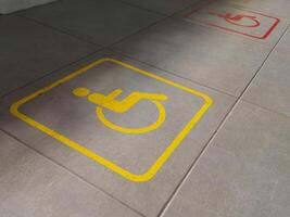 Handicapped Symbol for disabled parking area or wheelchair in hospital. Health concept. soft focus,Select focus photo