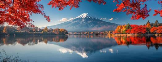 Mount Fuji in Autumn With Red Maple Trees photo