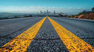 Empty Road Leading to Los Angeles Skyline on a Sunny Day photo