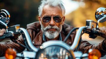 Man Riding Motorcycle With Hat and Goggles photo