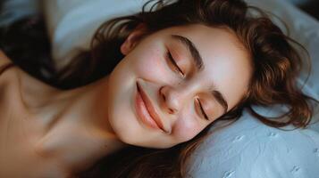 Woman Smiling in Bed photo