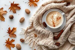 Warm Fall Morning Coffee With Blanket, Nuts, and Leaves photo