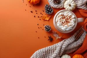 Cozy Autumn Scene With Pumpkin Spice Latte, Leaves, and Knitted Blanket photo