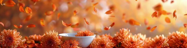 Orange Chrysanthemums Falling in a White Bowl in Soft Light photo