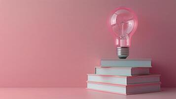 A Pink Lightbulb Atop a Stack of Books on a Pink Background photo