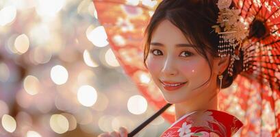Smiling Woman In Traditional Japanese Kimono Holds Red Umbrella photo