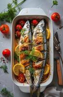 Baked Mackerel Fish With Lemon and Tomatoes photo
