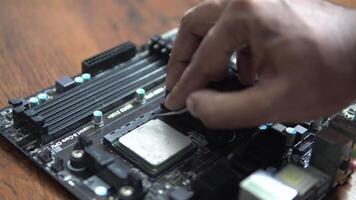 The Process of Removing CPU from a computer Mother Board. High Tech video