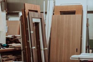 A vast warehouse in the forestry industry, showcasing a plethora of wooden products, including boards and various timber items neatly organized in storage photo
