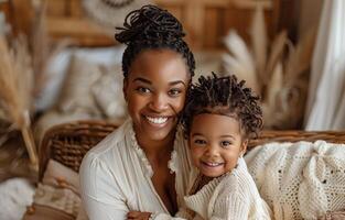 Smiling Mother and Daughter in a Cozy Home Setting photo