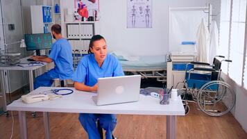 Physician assistant offering medical online advice for patient diagnosis using laptop. Practitioner consulting person during virtual discussion meeting helping, telemedicine and healthcare support, photo