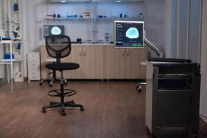 Empty laboratory modernly equipped with nobody in it, prepared for neurological innovation using high tech and microbiology tools for scientific research. Medical clinic for examining brain functions. photo