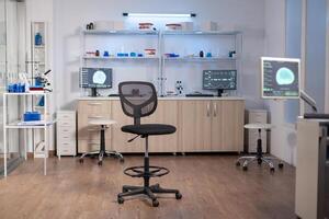 Empty laboratory modernly equipped with nobody in it, prepared for neurological innovation using high tech and microbiology tools for scientific research. Medical clinic for examining brain functions. photo