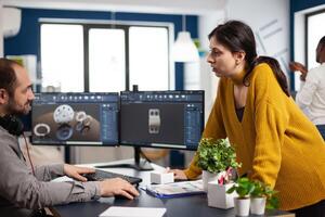 Teamwork engineer architects working on modern cad program developing construction metalic mechanism. Industrial designer studying prototype idea on pc showing digital software with gears concept photo