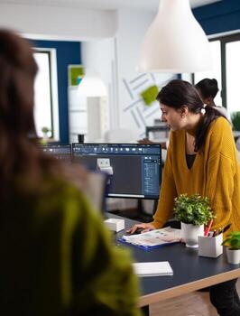 Teamwork engineer architects working on modern cad program developing construction metalic mechanism. Industrial designer studying prototype idea on pc showing digital software with gears concept photo