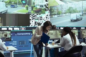Diverse staff looking at import logistics to help with order tracking and shipment via satellite map. Finding faster routes for delivery truck drivers, Agency operates CCTV public system. photo