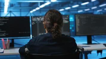 Person with disability in inclusive server hub workspace ensuring data remains shielded from threats. Close up shot of wheelchair user safeguarding data center establishment infrastructure photo