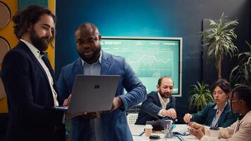 Business partners analyzing performance metrics within the organization. Conduct employee evaluations and discuss training to foster professional development and enhance team productivity. Camera B. photo