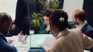 Diverse team of specialists developing corporate communications strategies, working together to ensure goals and achievements. Manager and employees collaborating on new project. Camera A. photo