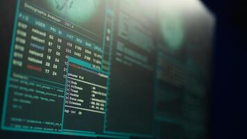 Close up shot of dangerous hacking code running on high tech computer system monitors. Programming scripts shown on PC displays in empty criminal hideout used by hackers to commit illegal activities photo