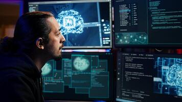 Hacker using AI machine learning on computer to produce malware corrupting data. Scammer working on PC using artificial intelligence tech, infecting systems, close up shot, camera B photo