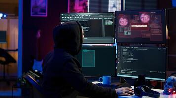 Hacker getting angry after failing to successfully develop spyware software stealing data. Frustrated scammer upset after written malicious code proves to be unsuccessful, camera A photo