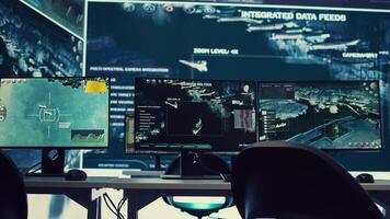 Federal agency command center equipped with surveillance and satellite system overseeing threats or danger on a world map. Military control room headquarters with a dashboard. photo