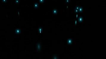 abstrato vôo azul faíscas em uma Preto fundo. Projeto. acima e baixa comovente minúsculo partículas. video