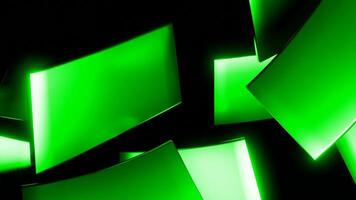 Abstract rotating neon tiles with glowing edges on a black background. Design. Spinning thin green tiles. video